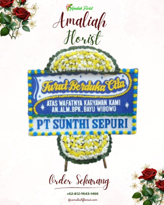 Papan Bunga Duka di Kayu Merah